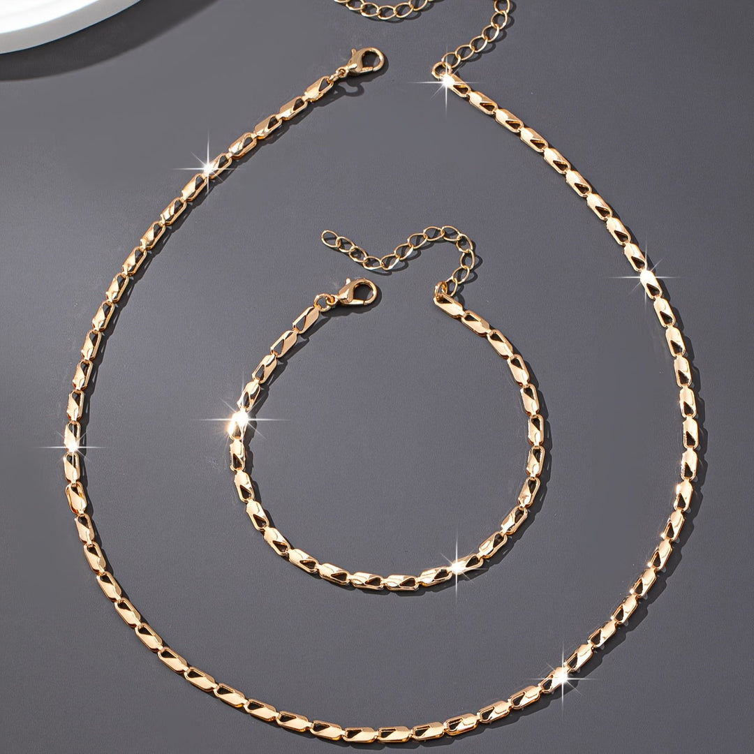 Elegant 18k gouden ketting- en armbandset