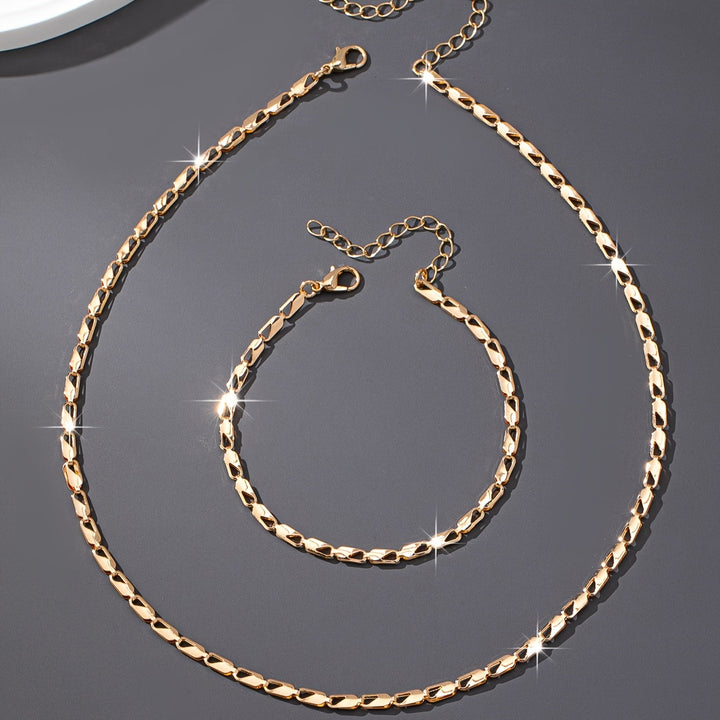 Elegant 18k gouden ketting- en armbandset