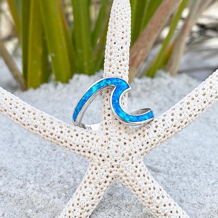 Golvende Zilveren Ring met Blauwe Opaal
