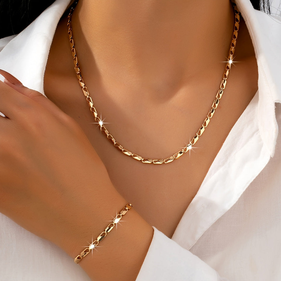 Elegant 18k gouden ketting- en armbandset