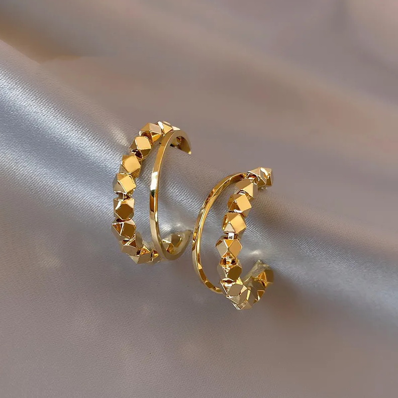 Elegante Gouden Oorbellen met Cubic