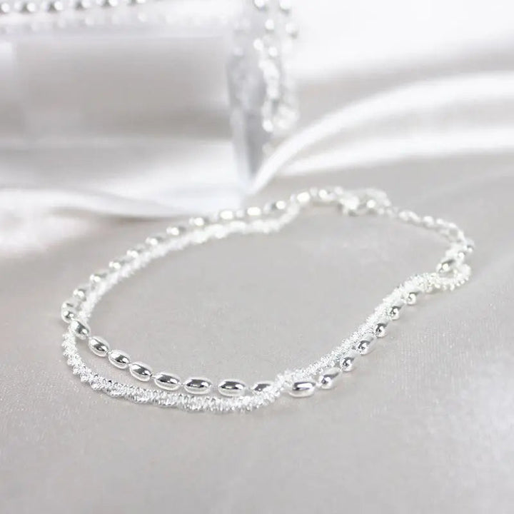 Elegante zilveren armbanden set met zirconium stenen
