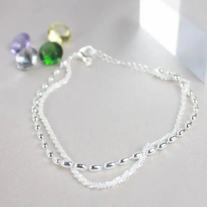 Elegante zilveren armbanden set met zirconium stenen
