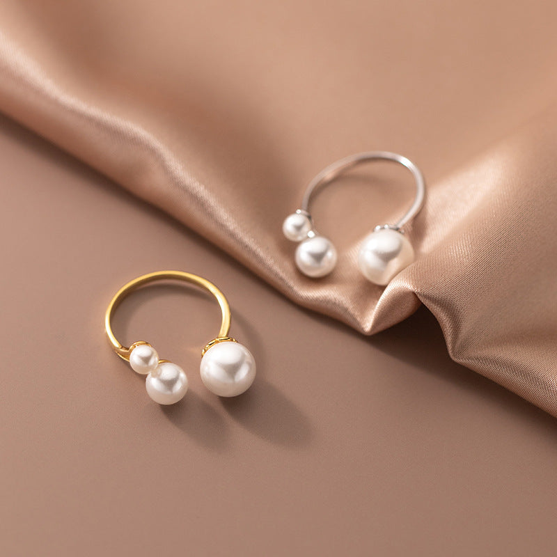 Elegante Ring met Trio van Parels