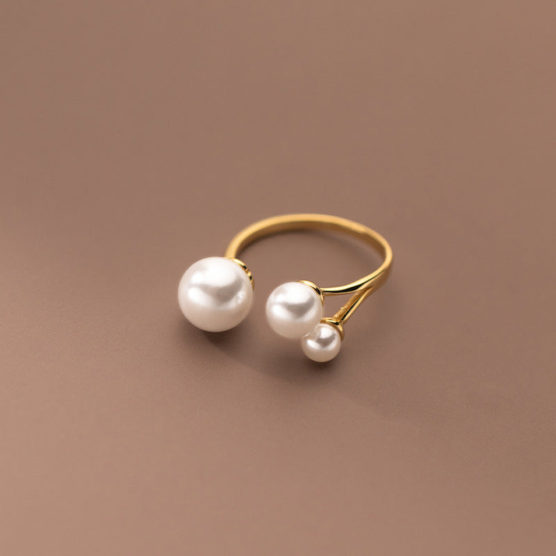 Elegante Ring met Trio van Parels
