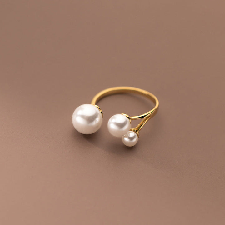 Elegante Ring met Trio van Parels