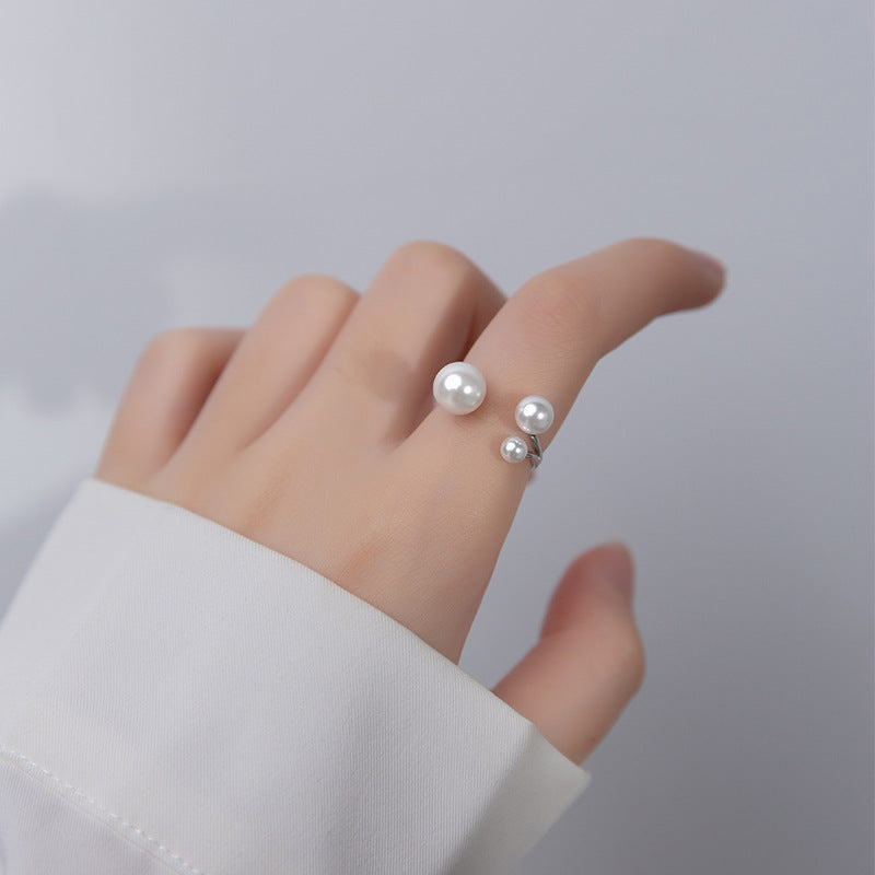 Elegante Ring met Trio van Parels