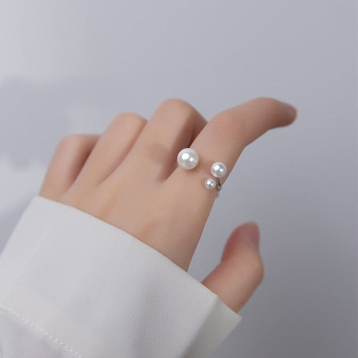 Elegante Ring met Trio van Parels