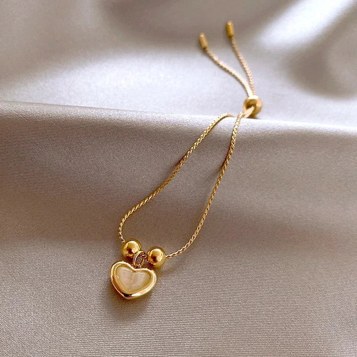 Hartvormige Armband van Perzikopaal Gecoat met Goud