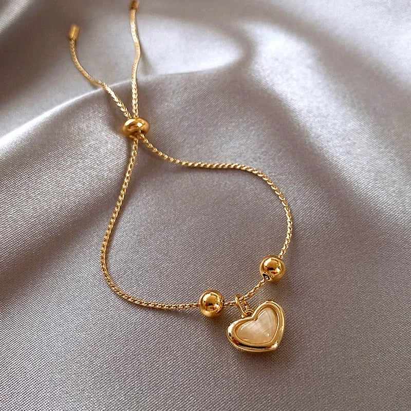 Hartvormige Armband van Perzikopaal Gecoat met Goud