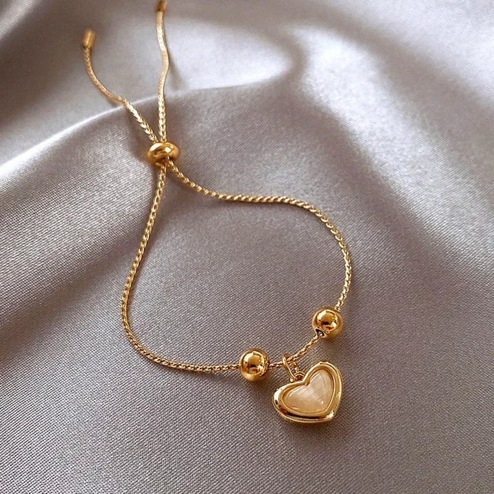 Hartvormige Armband van Perzikopaal Gecoat met Goud