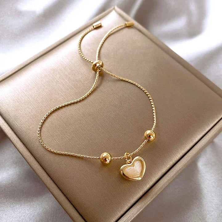 Hartvormige Armband van Perzikopaal Gecoat met Goud