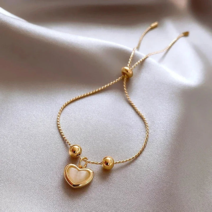 Hartvormige Armband van Perzikopaal Gecoat met Goud
