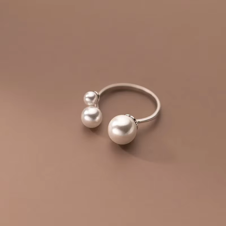 Elegante Ring met Trio van Parels