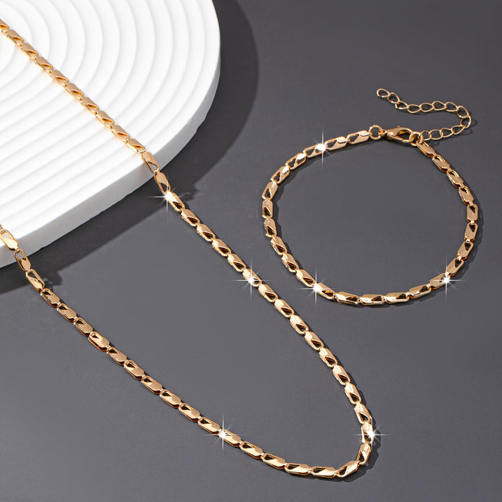 Elegant 18k gouden ketting- en armbandset