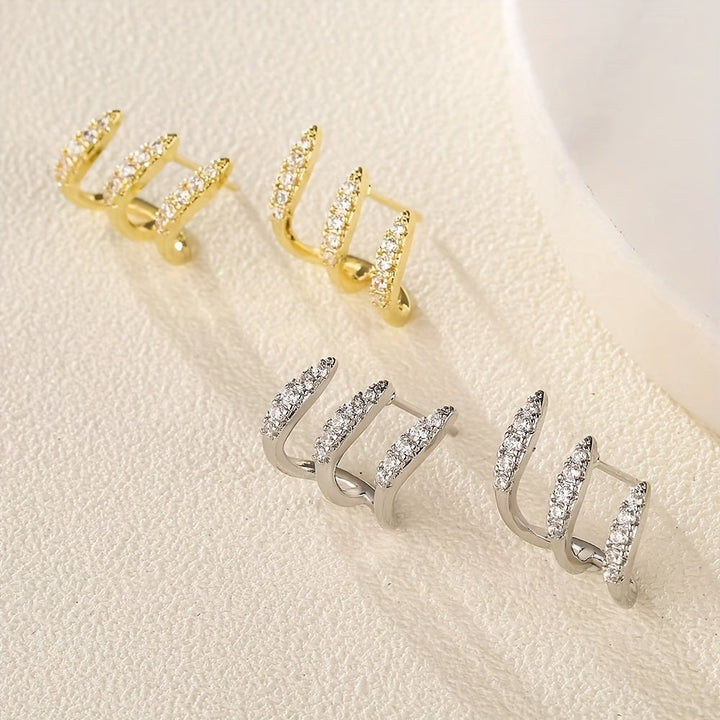 Elegante Oorbellen met Drie Klauwen van Strass