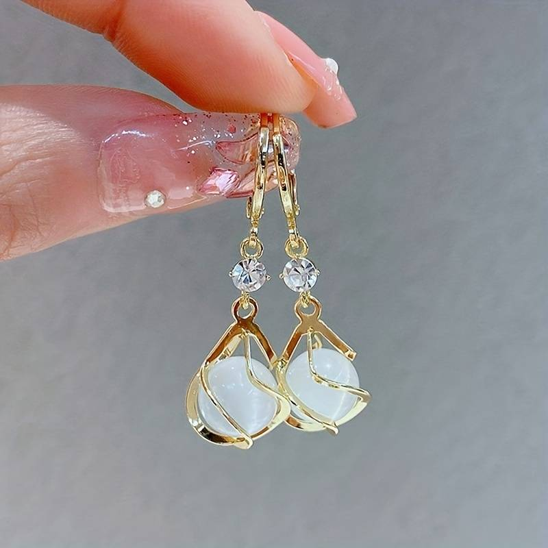 Elegante Hangende Oorbellen met Witte Opale