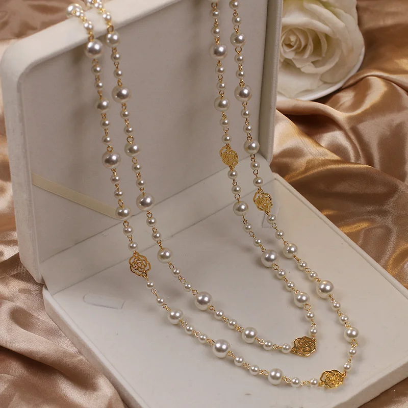 Elegante gouden collier met parels