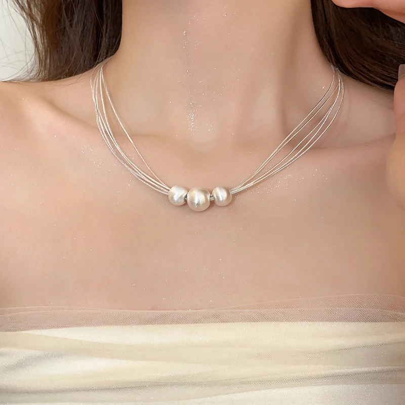 Elegante Laagjes Halsketting met Witte Parel
