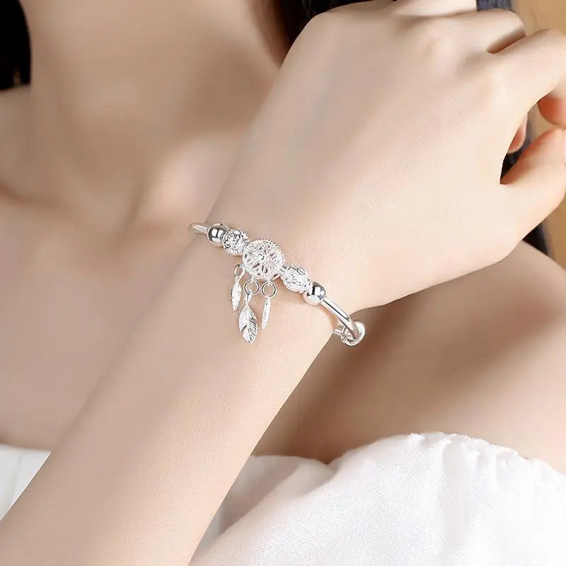 Zilveren armband met dromenvangerhanger