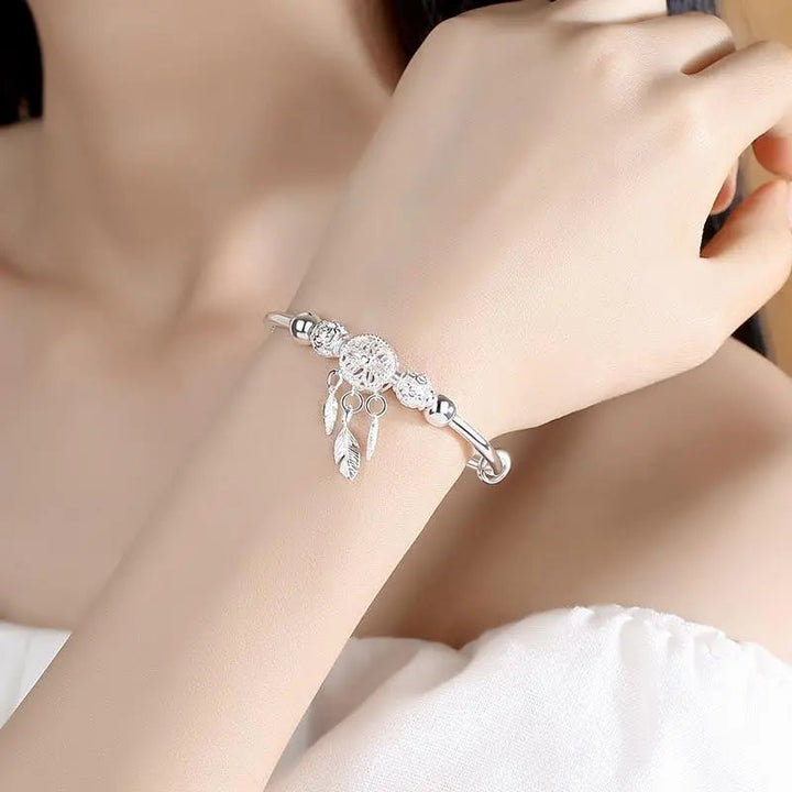 Zilveren armband met dromenvangerhanger