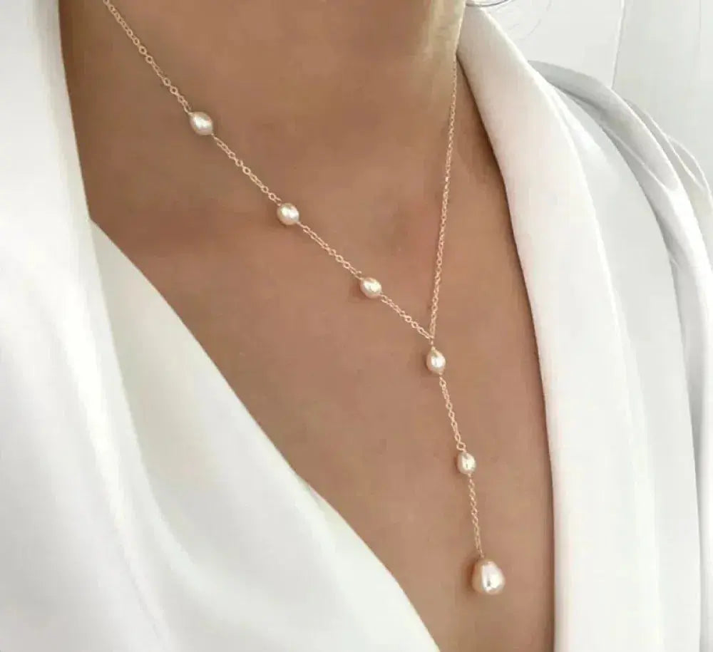Elegante vintage collier met hanger en parels